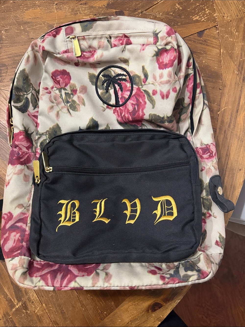 BLVD Cream Floral & Black Front-Pocket Backpack with Gold Logo